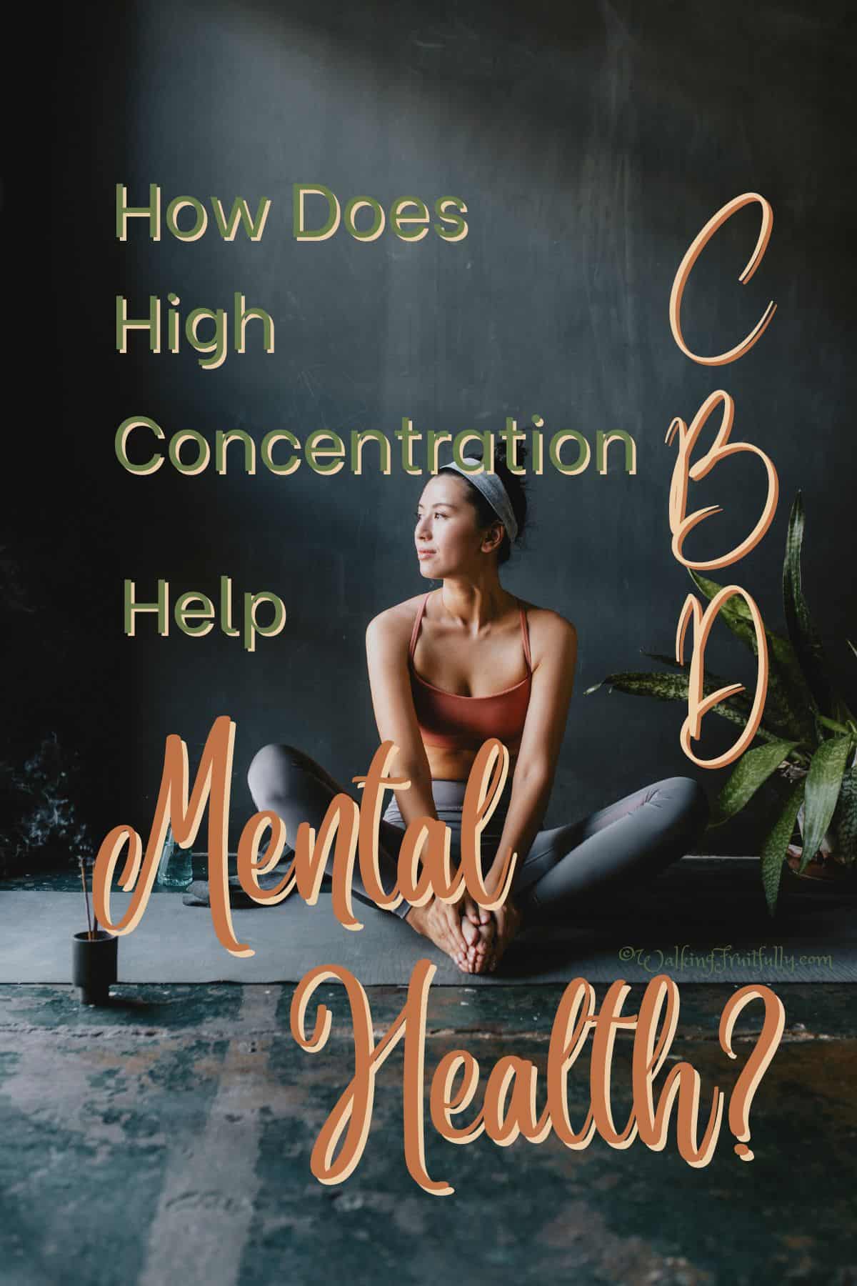 Woman wearing orange tank and grey leggings sitting on grey floor against darker grey wall a potted plant beside her | How Does High Concentration CBD Help Mental Health?