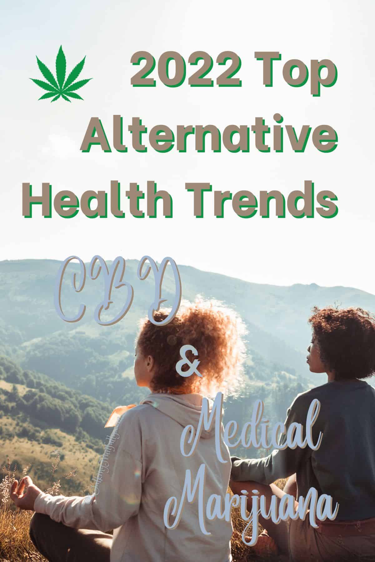 Women sitting on ground overlooking mountain valley | 2022 Top Alternative Health Trends: CBD & Medical Marijuana