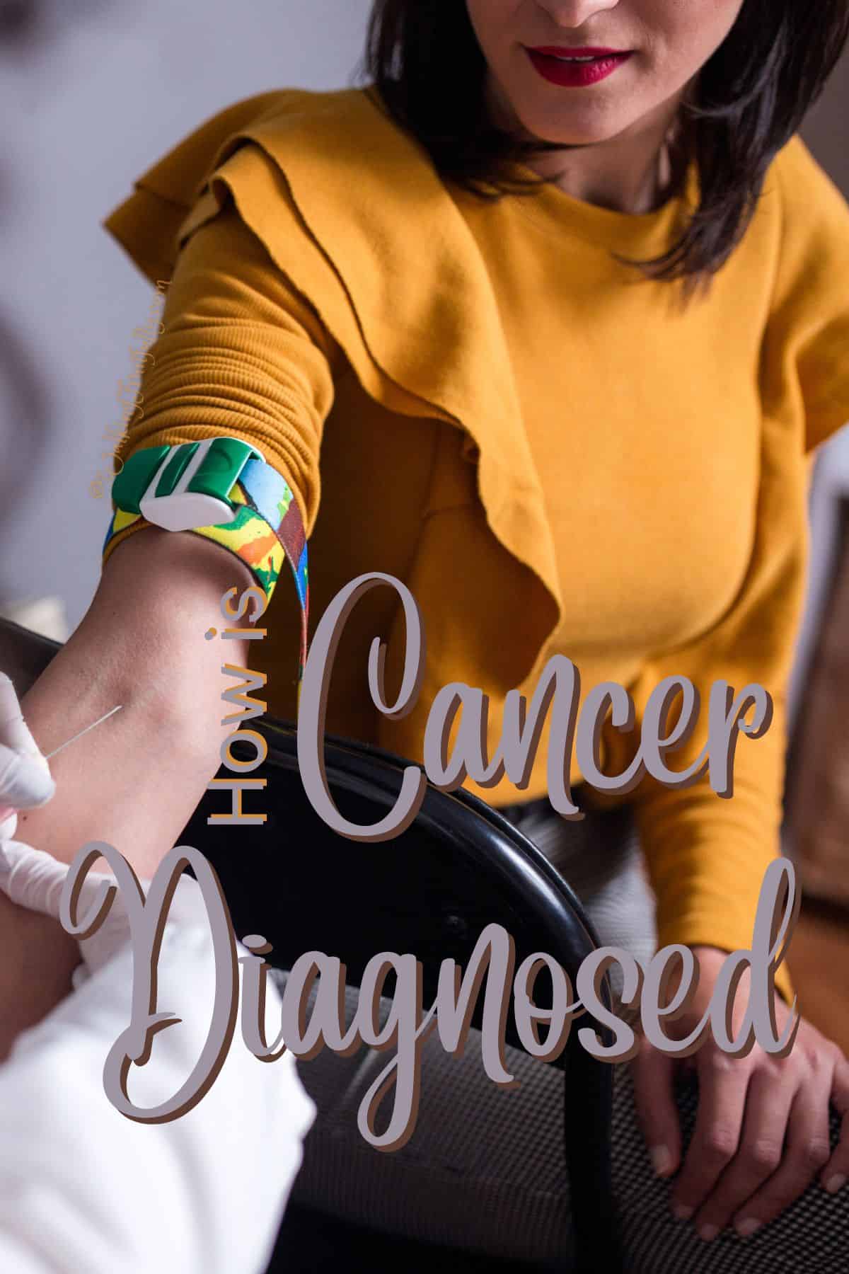 Women in yellow shirt having blood drawn | How Is Cancer Diagnosed?
